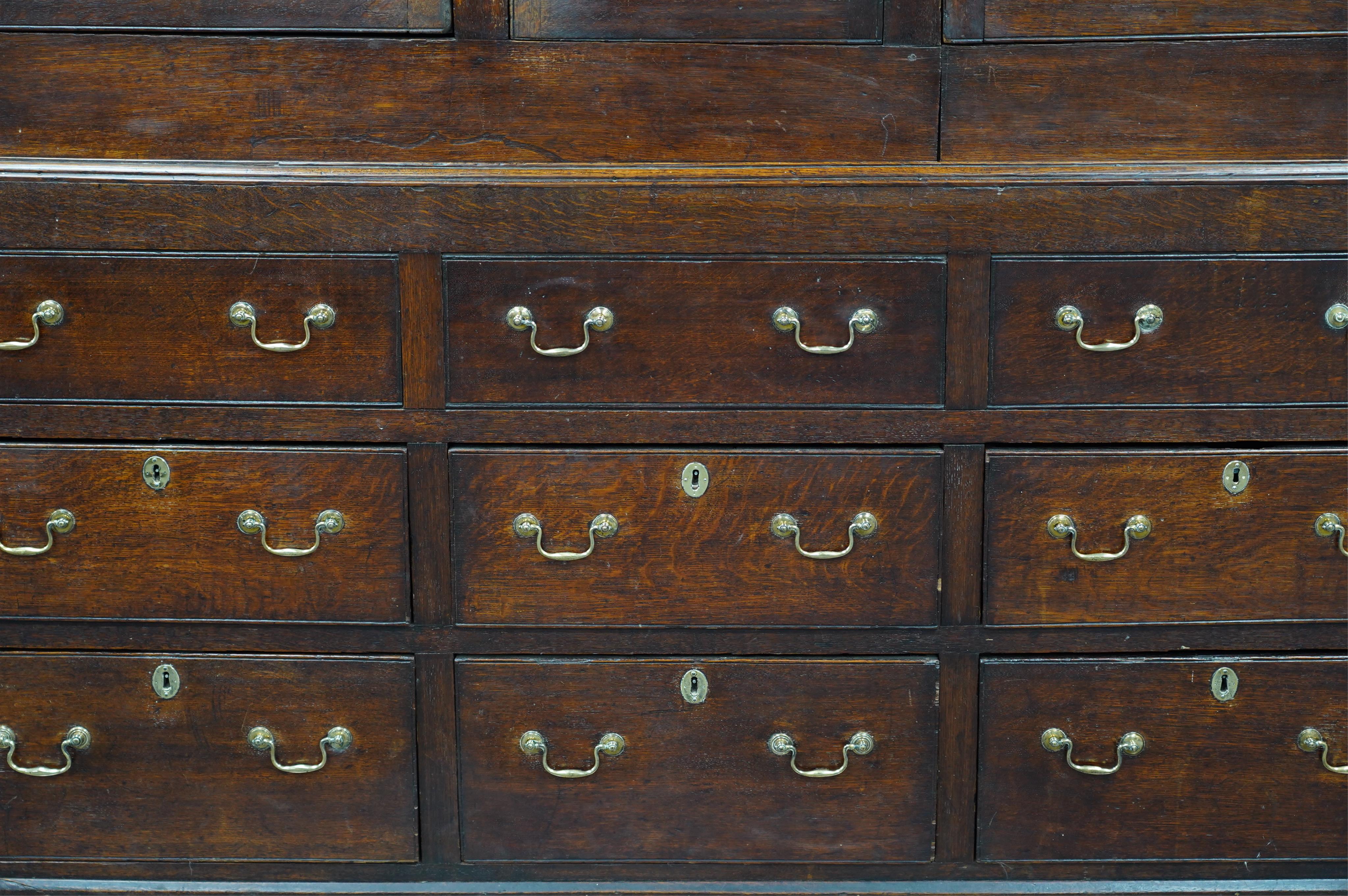 A mid 18th century oak press cupboard